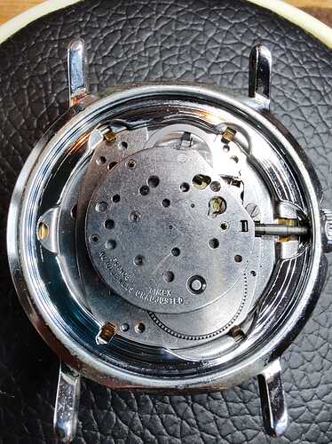 06 Timex achter