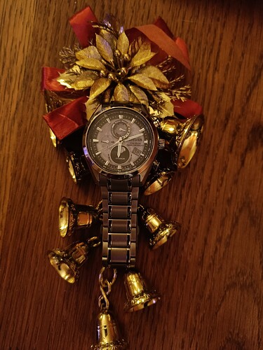 kerstbel met horloge