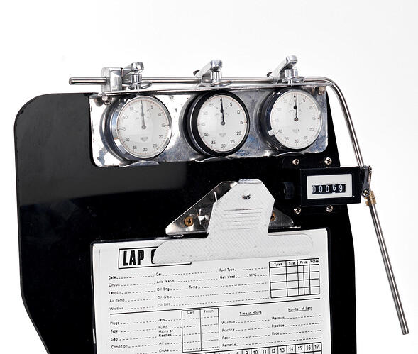 Timekeepers-Clipboard-With-Three-Heuer-Stopwatches-1