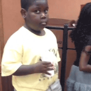 Huh GIF - Awkward Black Kid - Discover & Share GIFs